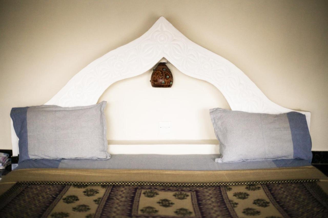 Coconut Village Beach Resort Diani Beach Bagian luar foto