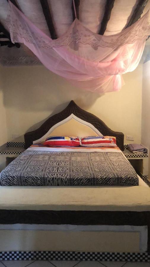 Coconut Village Beach Resort Diani Beach Bagian luar foto
